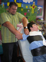 Dr. Fred Clary DC works with Max, Cerebral Palsy patient New Brighton, MN
